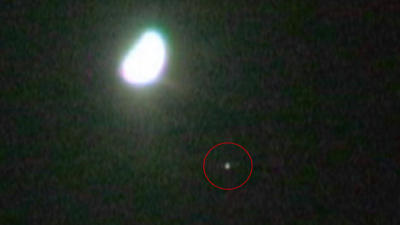 Large Orb UFO by Moon